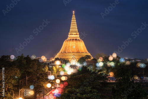 The long exposure image of the Phra Pathom Chedi pagoda illuminating in the midnight. Religion buddhism concept background. Nakhonpathom Thailand.