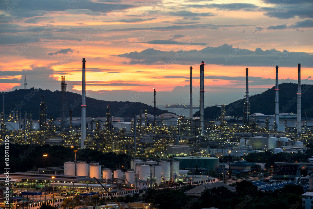 Beautiful sunset  petrochemical oil refinery factory plant cityscape of Chonburi province at night  , landscape Thailand