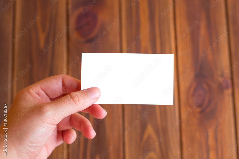 Obraz premium Business card on a wooden background