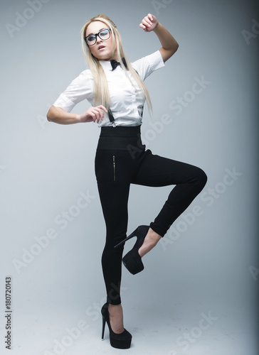 Fashion girl model posing on white background 