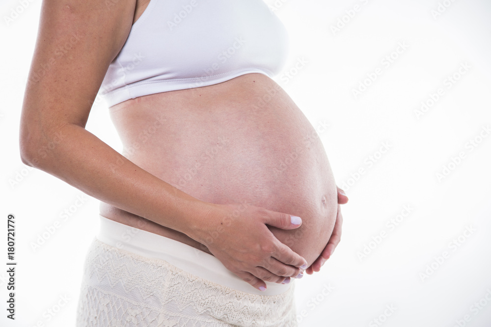 Close up of pregnant belly. Close up of pregnant belly.