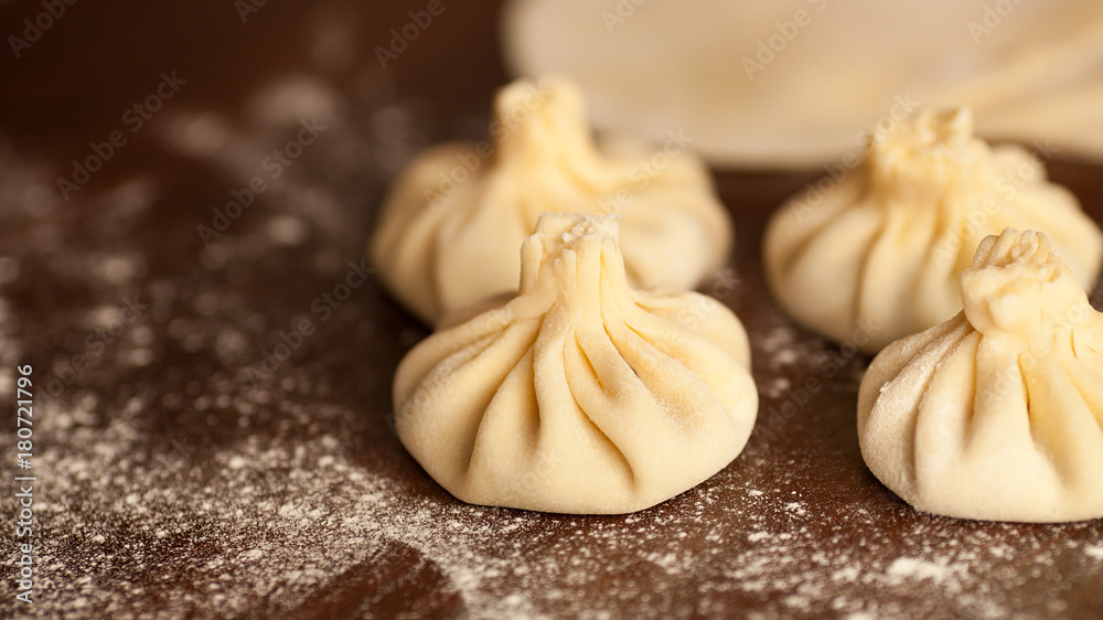 Khinkali is the national dish of Georgian cuisine. Products meat and dough with spices. Selective focus