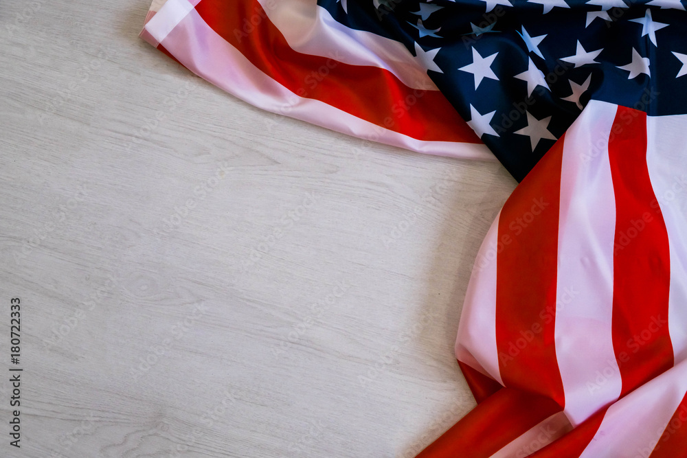national flag of USA. Natural light. Selective focus. Close up on a gray background. Top view, flat lay. copy space. national flag of USA. Natural light. Selective focus. Close up on a gray background. Top view, flat lay. copy space.