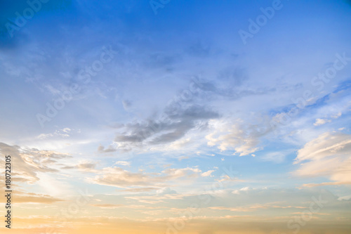 Dramatic sunset and sunrise sky with beautiful and colorful nice soft cloud background concept.