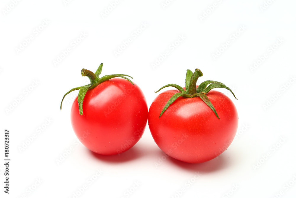 small tomatoes isolated on white background small tomatoes isolated on white background