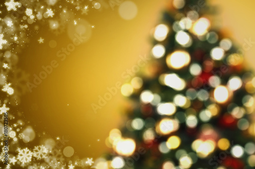 christmas tree background, image blur colorful bokeh defocused lights decoration and gold backgroud