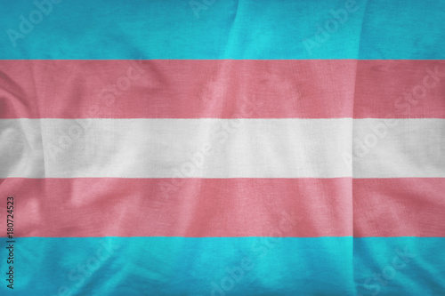 Transgender Pride flag pattern on the fabric texture ,vintage style. Type of sexual minorities.