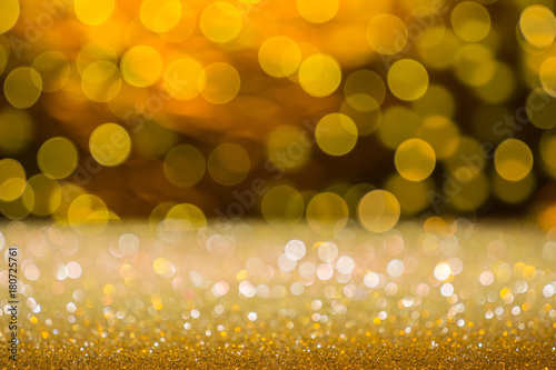 Golden glitter background, lights bokeh