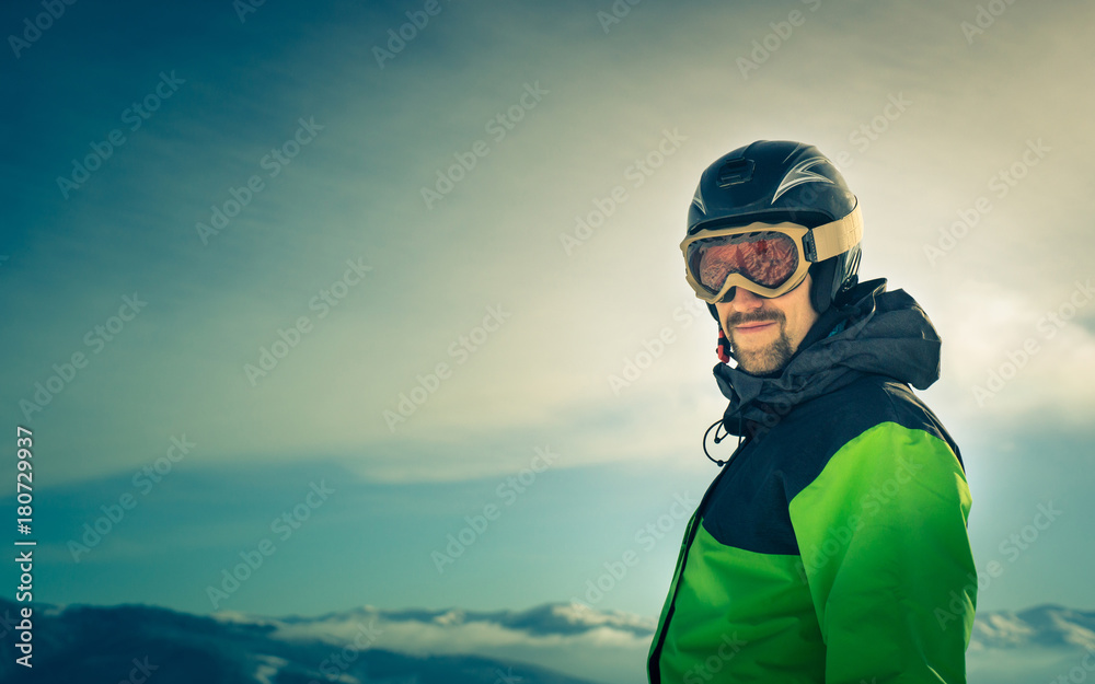 Portrait of a skier in the mountains. Portrait of a skier in the mountains.