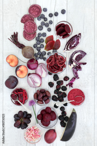 Health food of fruit and vegetables high in anthocyanins, antioxidants and vitamins of red, purple and blue foods. Healthy eating concept. Top view.