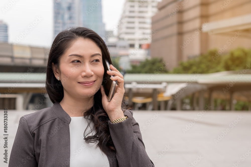 business success concept : business women call smartphone ,successful smile business success concept : business women call smartphone ,successful smile