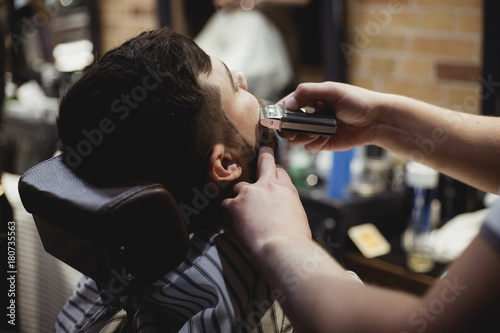 the man is sheared in barbershop