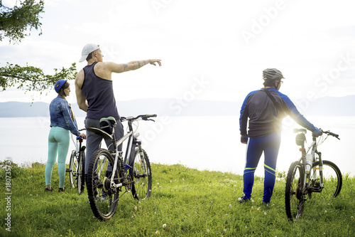 People travelling on a bicycle