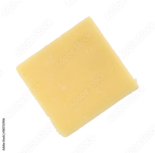 Top view of a single slice of a sharp cheddar cheese square isolated on a white background.