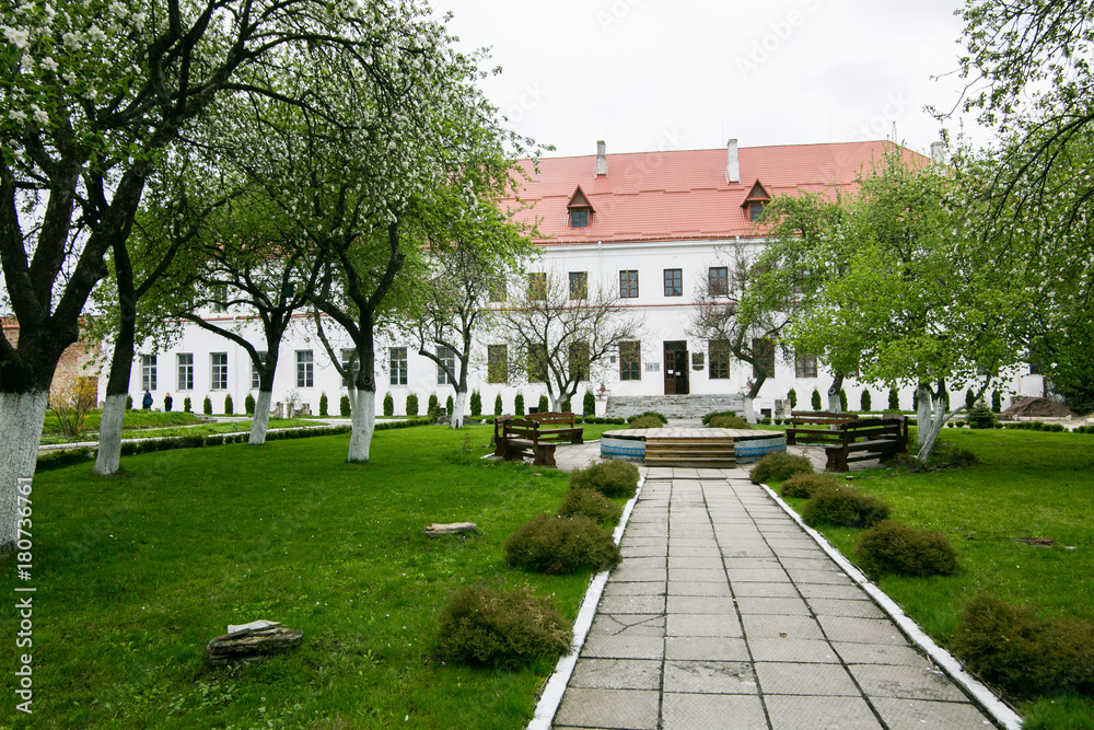 Well-preserved old building with garden and green alley at the Dubno Castle in Ukraine