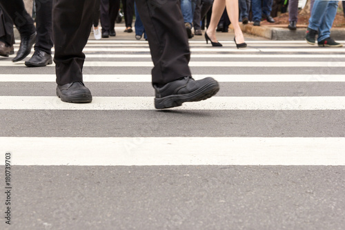 Crosswalk and anonymous people crossing the street. © Vergani Fotografia