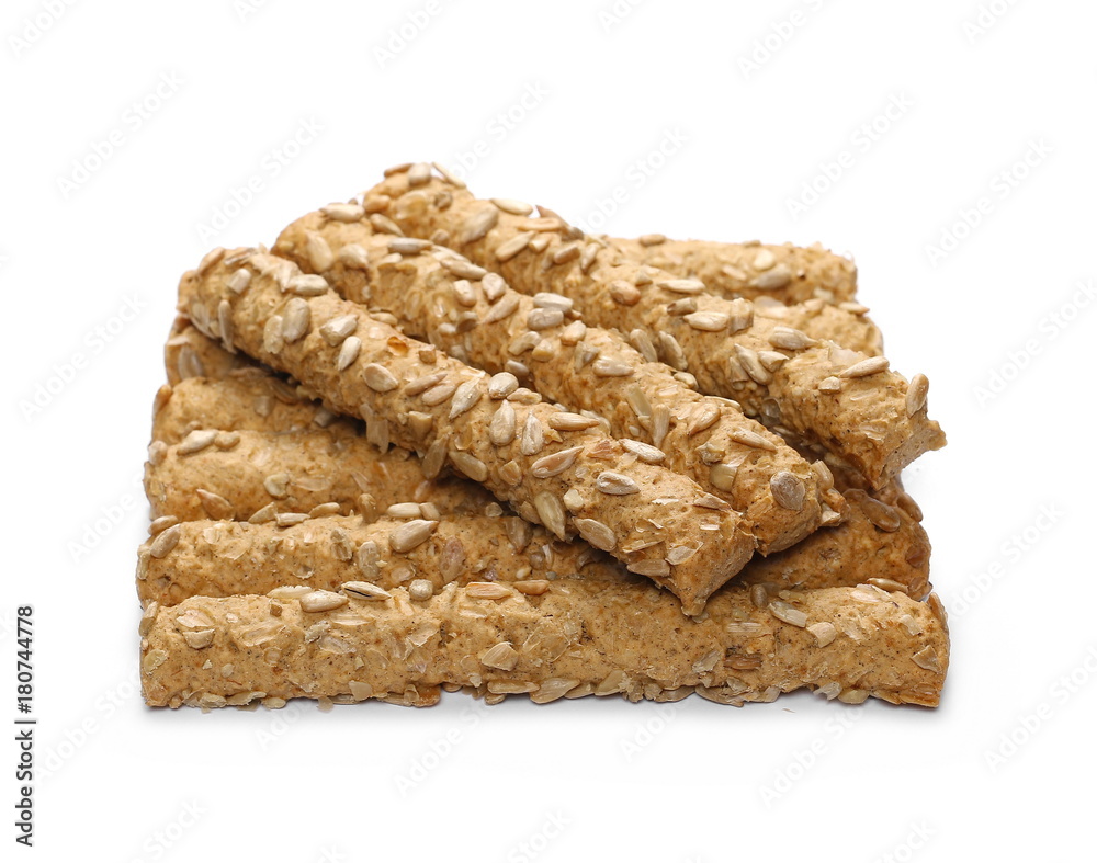 Integral bread sticks with sunflower seeds isolated on white background Integral bread sticks with sunflower seeds isolated on white background