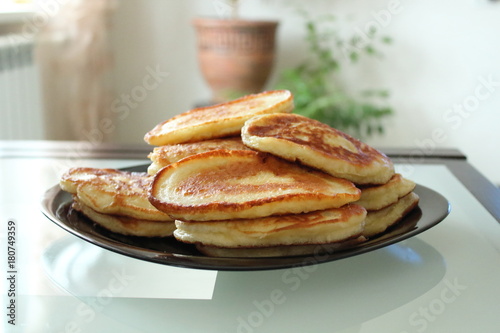 delicious pancakes on the plate cooked at home.