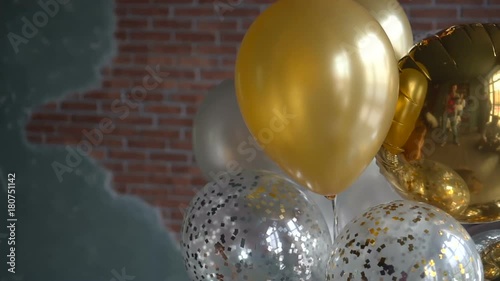 Gold and silver balloons background. Birthday day or any holiday concept photo