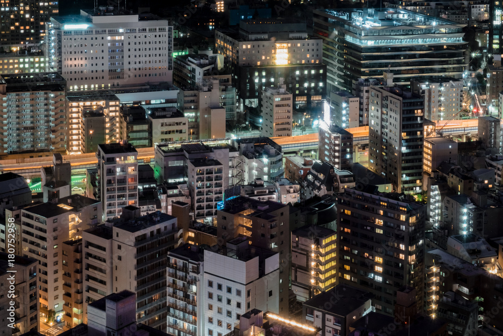 Night city building skyline with colorful of light, Business architecture, Skyscrapers and light trails
