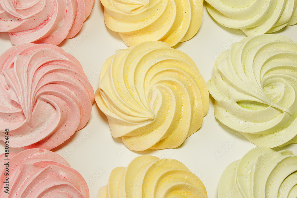 Fototapeta premium Meringues on a white background