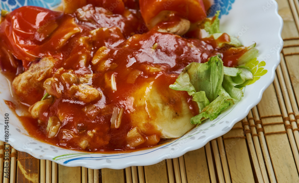 Naklejka premium Pollo en Manchamanteles