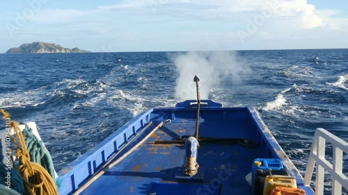 beautiful view of islands off the coast of the philippines from boat photo