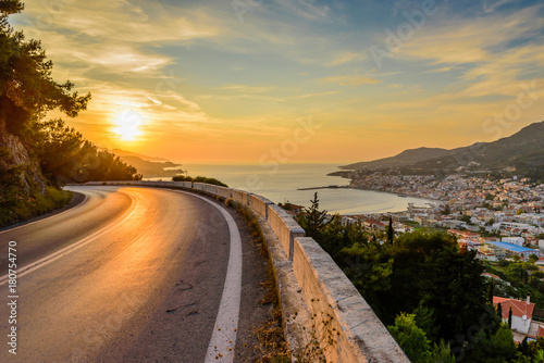 Road in the sunset. View of Samos town at sunset, Samos island, Greece