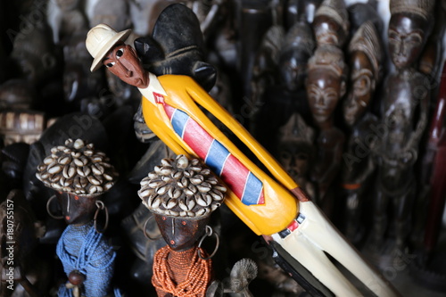 wooden small statues from Abidjan in ivory coast photo