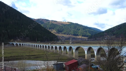 view of viaduct Poiana Largului at the lake Bicaz, Romania photo