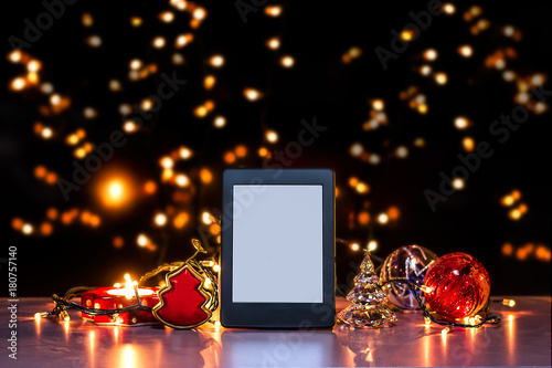 E reader on flat surface, Christmas theme