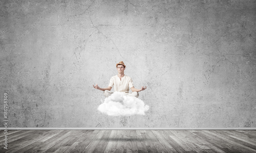 Fototapeta premium Young man keeping mind conscious.