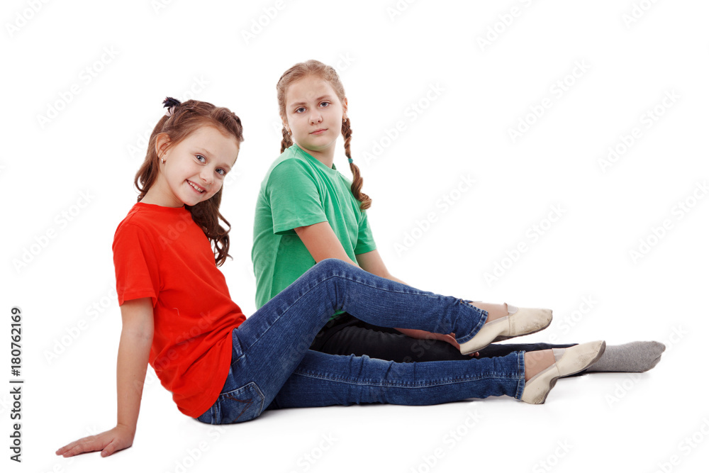 Two happy teenage girls isolated on white background Two happy teenage girls isolated on white background