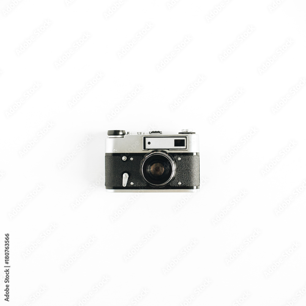 Retro photo camera. Minimalistic hipster flat lay concept. Retro photo camera. Minimalistic hipster flat lay concept.