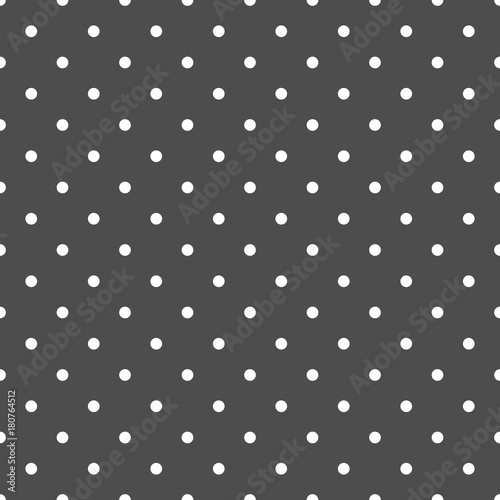 White polka dots on grey background