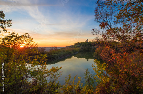 Fototapeta Naklejka Na Ścianę i Meble -  Farfa (Rieti, Italy) - The little lake of Baccelli at sunset, in the heart of Sabina region, during the autumn with foliage
