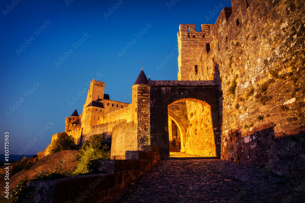 Cite de Carcassonne, France, small alleys during sunset.
