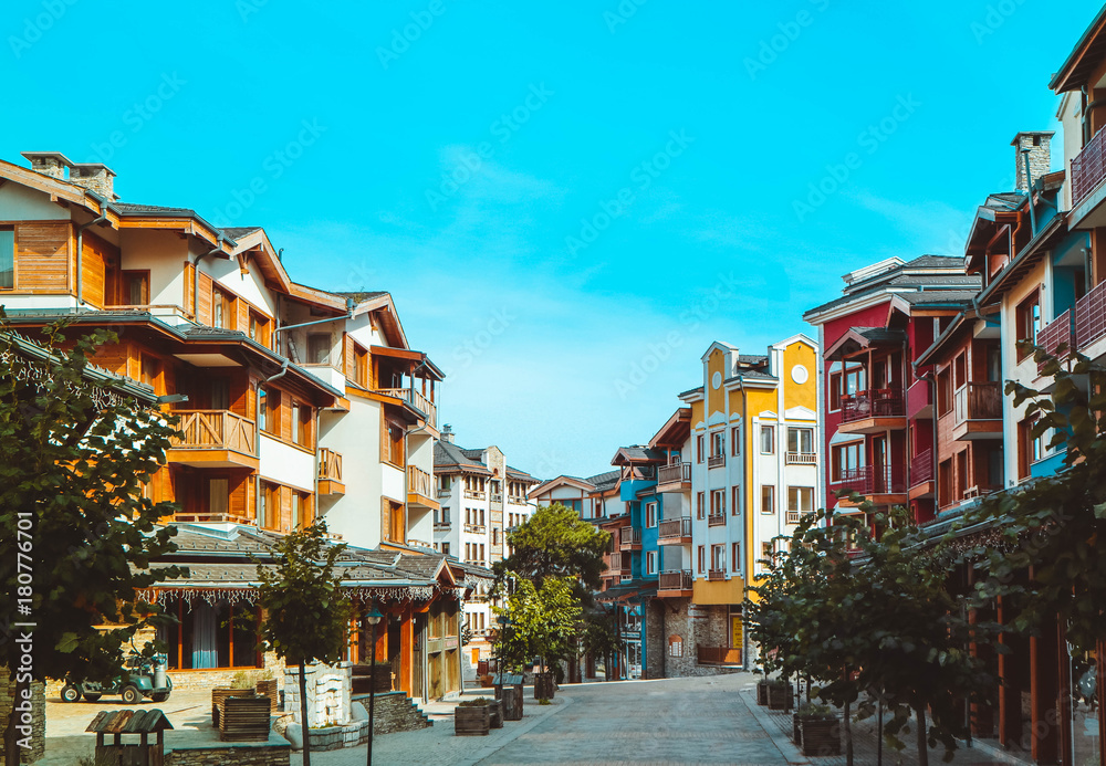Obraz premium Apartments in Balkans Mountains, Europe, Bulgaria. Luxury houses at the Pirin Golf village, summertime.