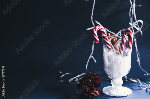 lollipops in a snow-covered glass