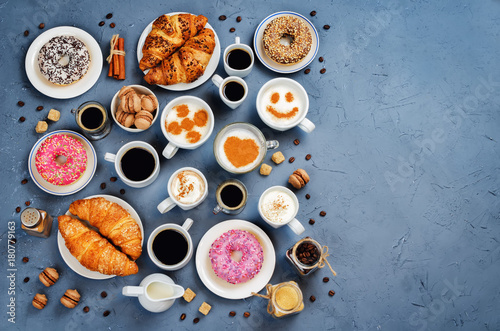 Stone background with different types of coffee and desserts to them