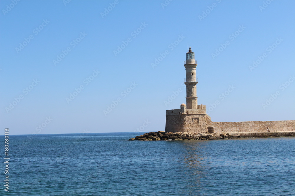 Lighthouse in the old Venetian Harbor of Chania, in Crete Island, Greece.