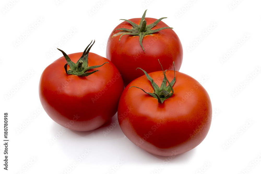 Tomatoes with leaf isolated on white. Tomatoes with leaf isolated on white.