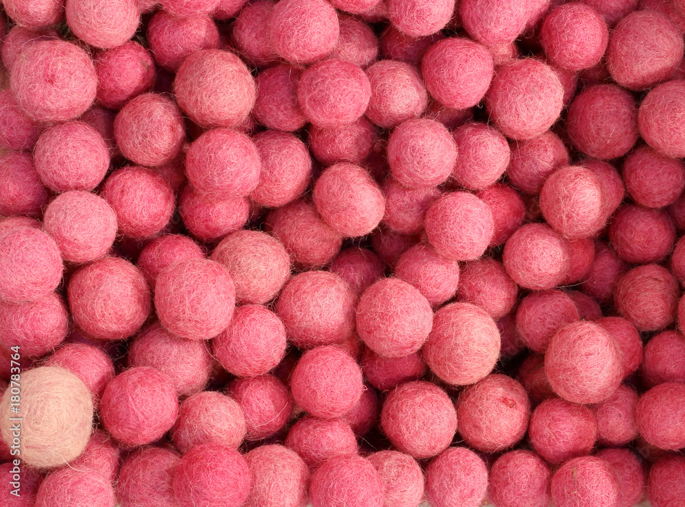 background of pink felt balls background of pink felt balls