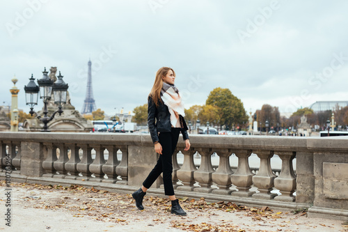 Photography Beautiful Parisian girl walking near the Eiffel tower
