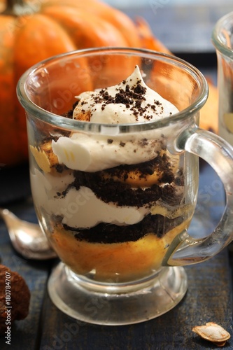 Homemade Pumpkin Mousse Parfait / Thanksgiving dessert, selective focus