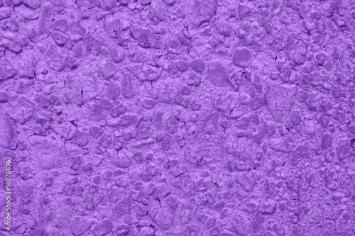Violet wall of natural stone, texture, background