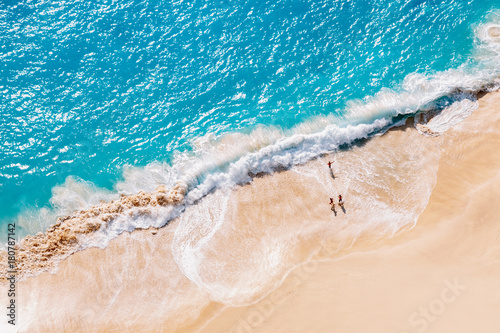 Aerial view to tropical sandy beach and blue ocean