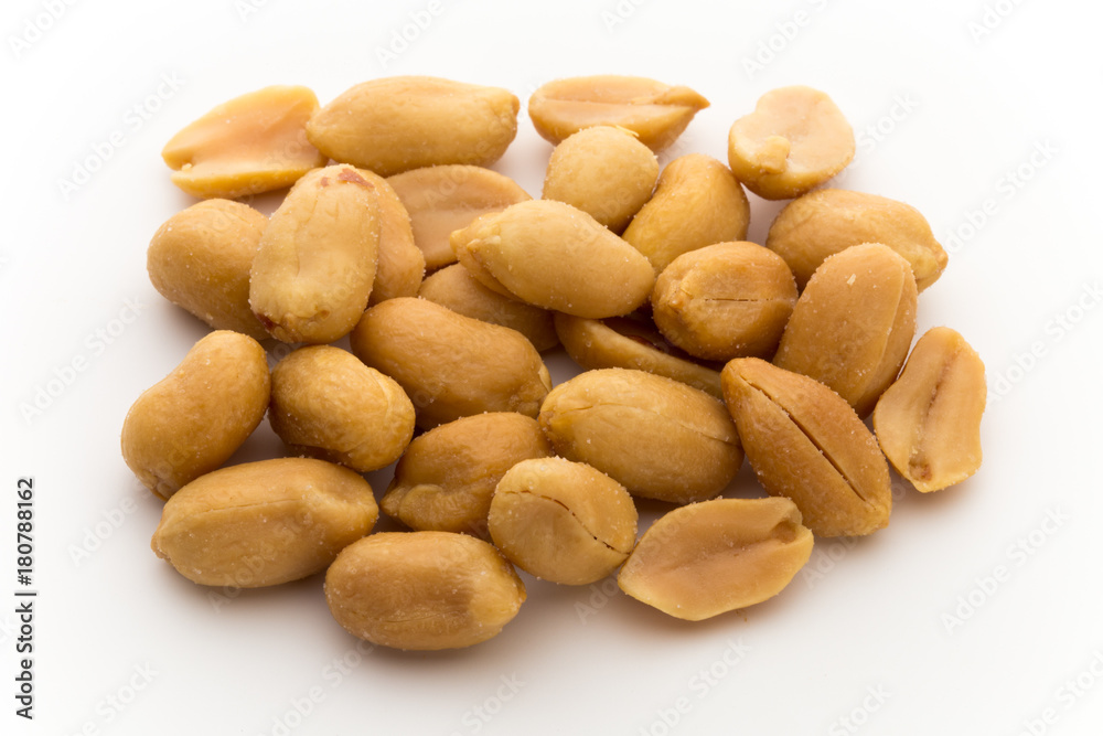 Peeled peanuts on the isolated background. Peeled peanuts on the isolated background.