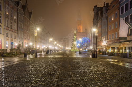 Misty scenery. Night at medieval Long Market street (Dlugi Targ) in Gdansk. Poland.