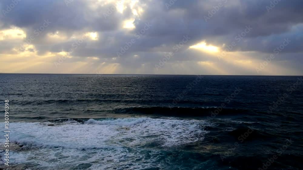 Cloudy sky over the coast at sunset. Alghero, Sardinia Cloudy sky over the coast at sunset. Alghero, Sardinia